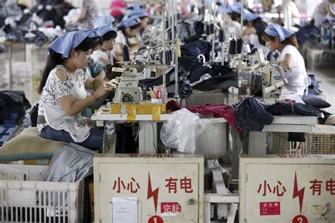 China factory activity shrinks in July, adding to pressure to reverse economic slump